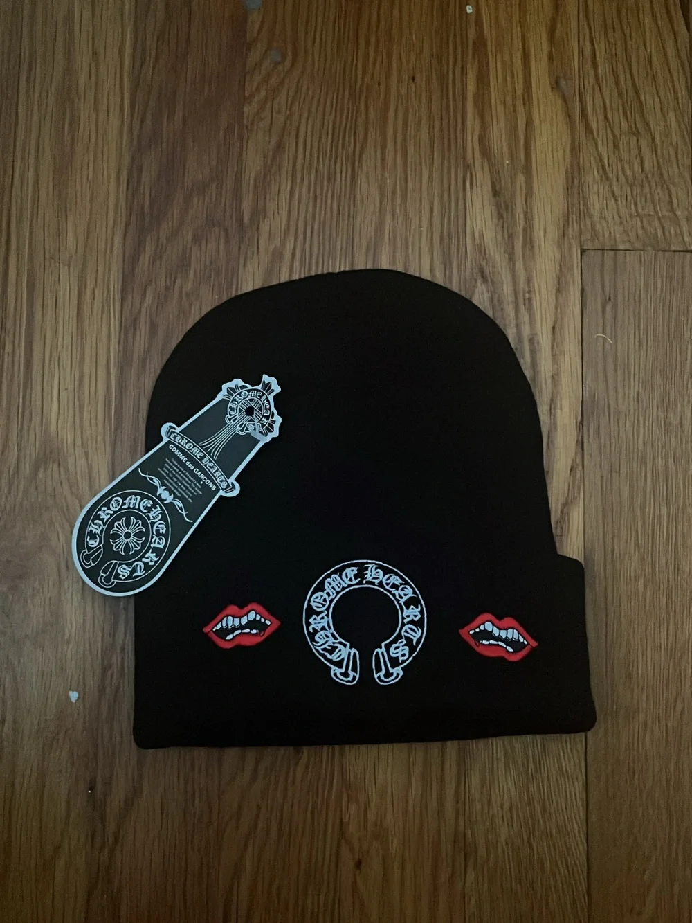 Black Beanie Hat with Red Lip Embellishments